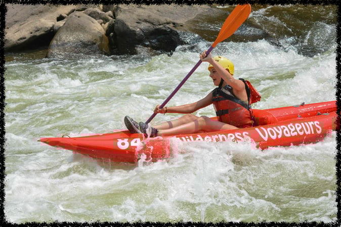 A male Camper White Water Rafting
