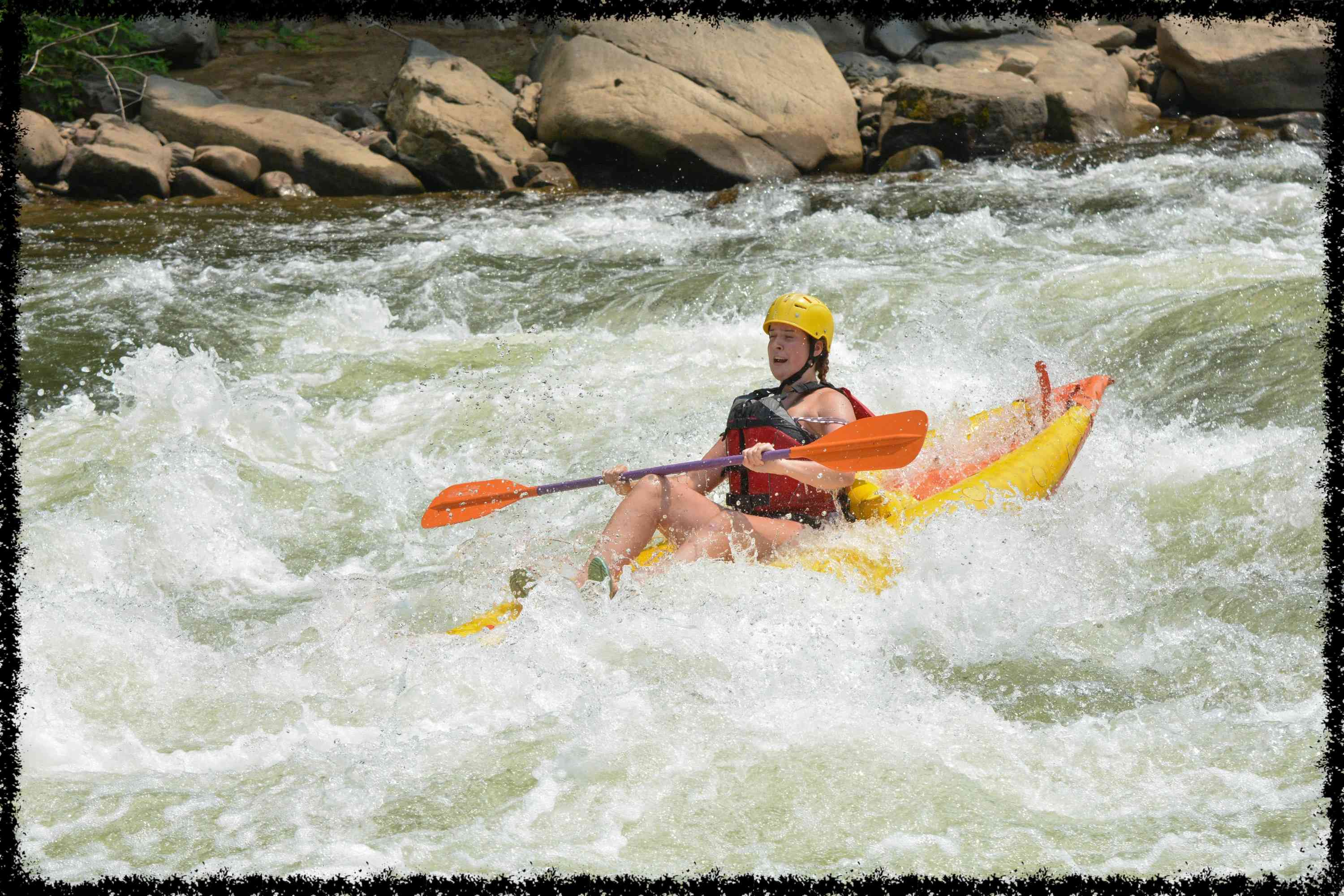 A male Camper White Water Rafting