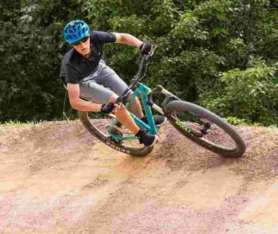Picture of a Camper riding a bike