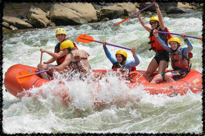 A group of Campers White Water Rafting