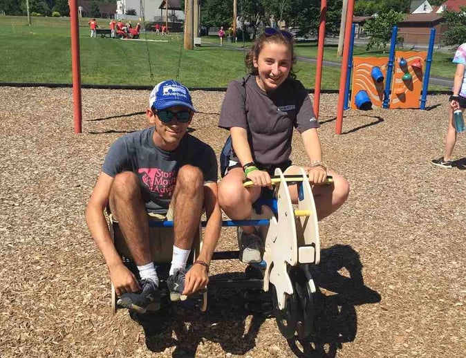 A male and a female Camper pose for a picture