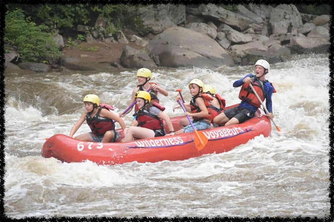 A group of Campers White Water Rafting