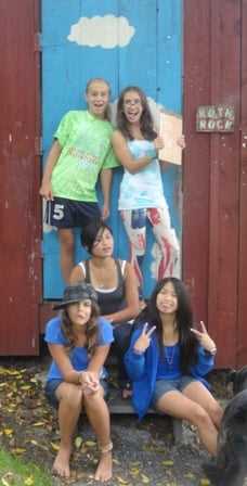 Five female Campers posing for  a group picture.