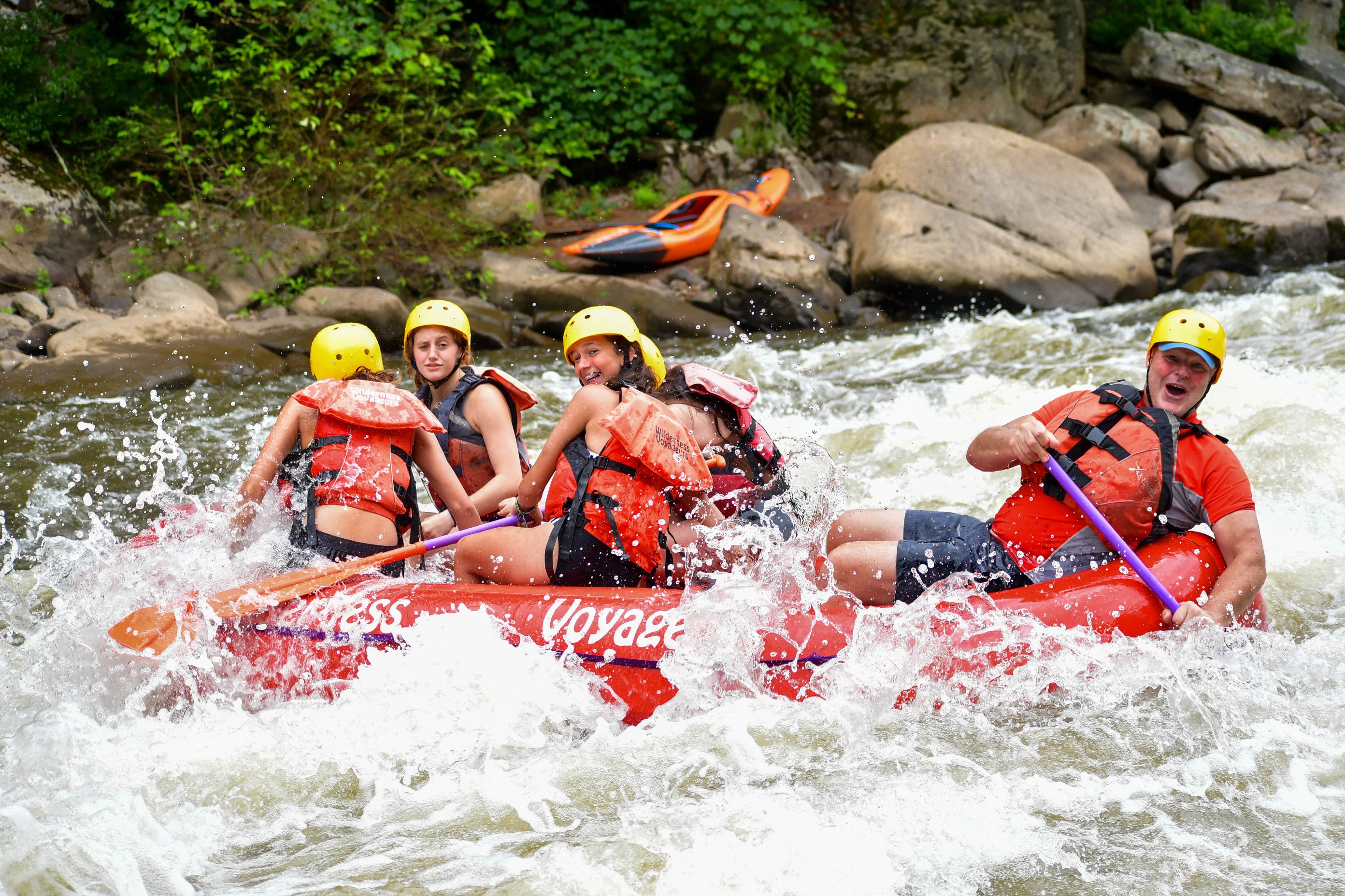 A group of Camper White Water Rafting