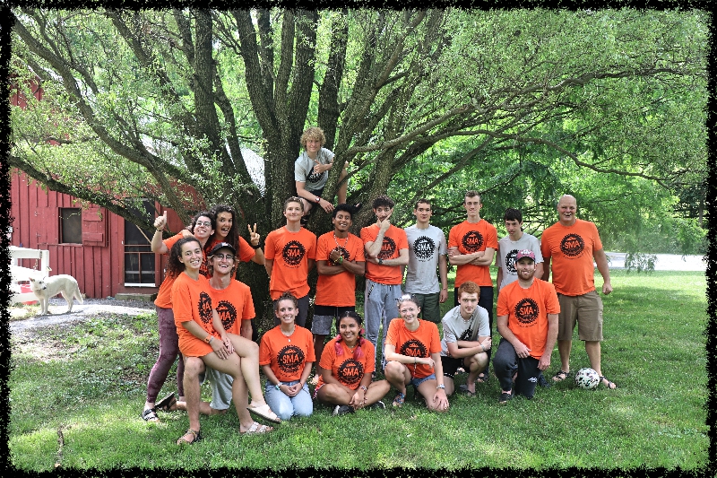 A group of Campers in SMA T-shirt pose for a picture