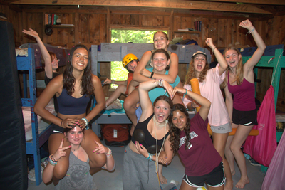 A group of Teen female Campers pose for a picture.