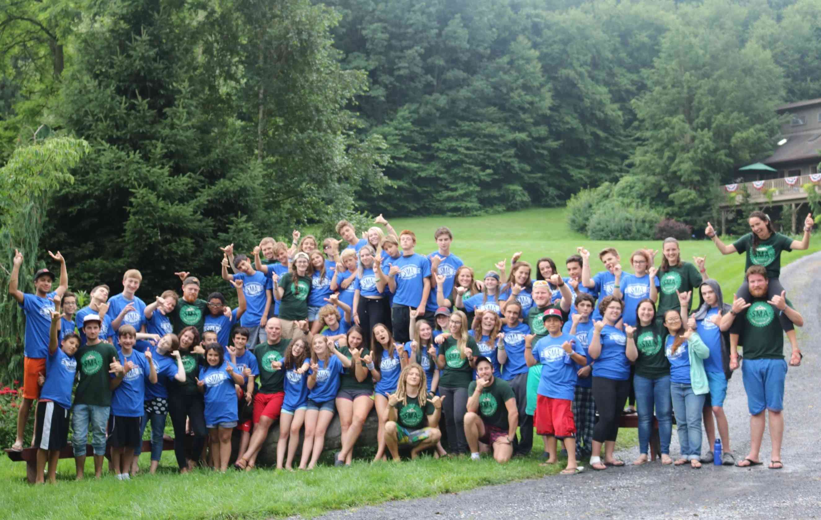 SMA 201 5 2 weeks Summer Camp Staff and Campers pose for a group picture in SMA T-Shirt.