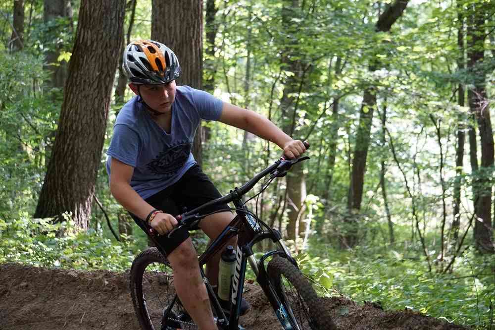 A Male Camper Mountain Climbing