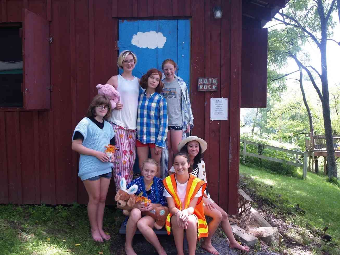 A group of Teen female Campers pose for a picture.