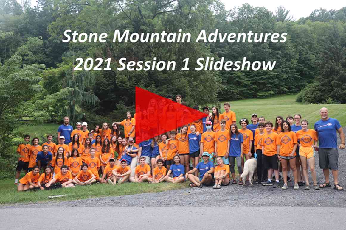 A group of Campers and the director Jud pose for a picture in SMA T-shirt