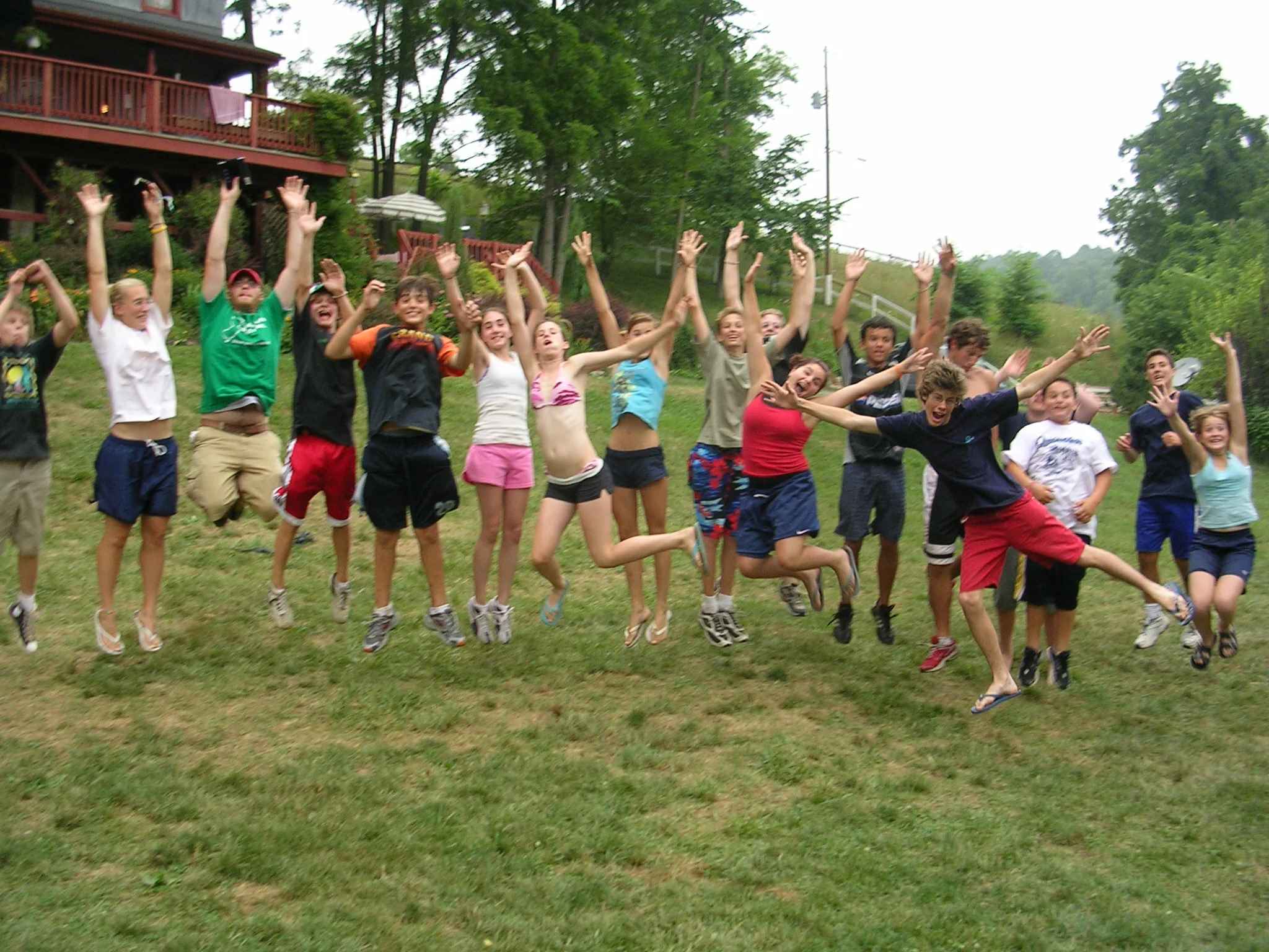 Picture of a group of Campers jumping up in excitement 