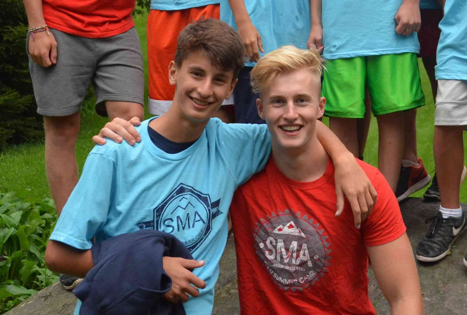 2 Male Campers pose for a picture in SMA's T-Shirt