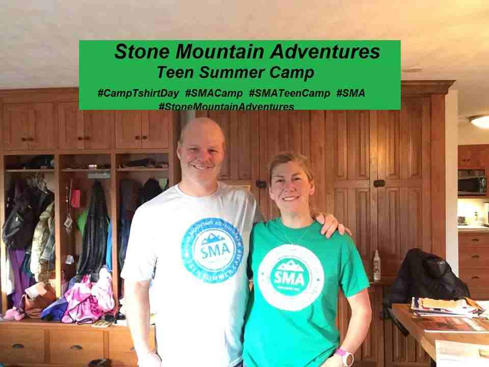 Director Jud and a male Camper pose for a picture in SMA T-Shirt.